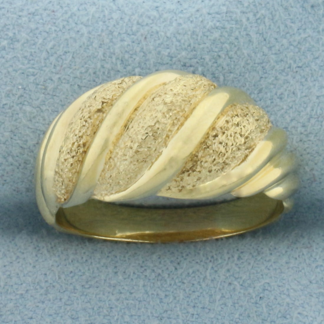 Sandblast Finish Dome Ring in 14k Yellow Gold: In 14k Yellow Gold. 10.6mm wide at center. Dual finish, high polish and sandblasted finishes for unique look. Size 8.75. 6.4g.