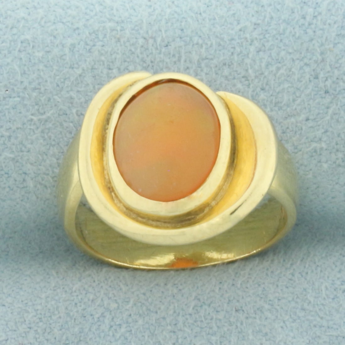 Vintage Fire Opal Solitaire Ring in 14k Yellow Gold: In 14k Yellow Gold. Contains one 8x10mm high quality natural Fire Opal gemstone. 15mm wide at top. Size 7. 7.3g