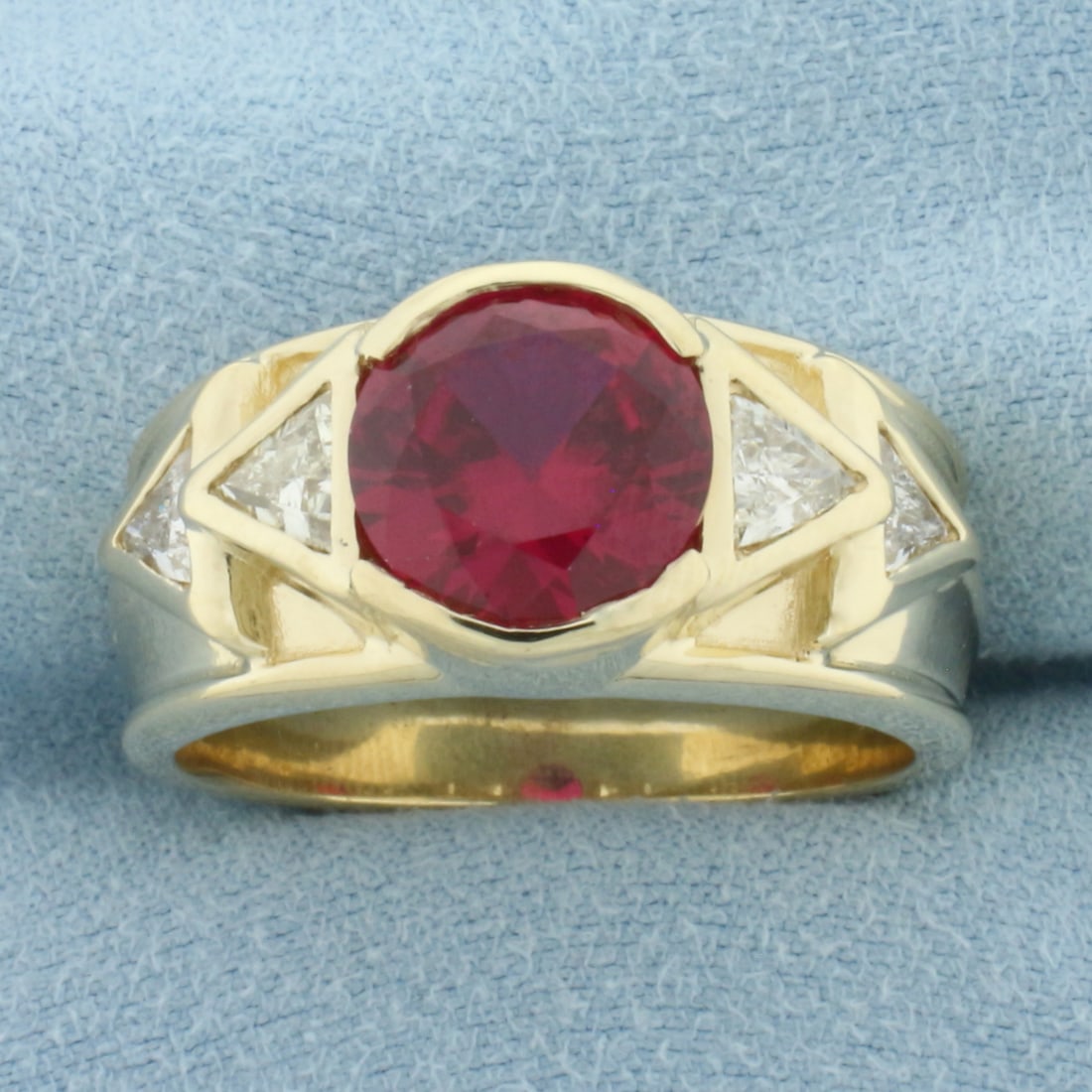 Mens Lab Ruby & Diamond Ring in 14k Yellow Gold: In 14k yellow gold. 11.7mm wide at top of ring. Contains one lab created high quality Ruby gemstone, approximately 4ct, with vibrant color and excellent clarity. Also contains four high quality natura