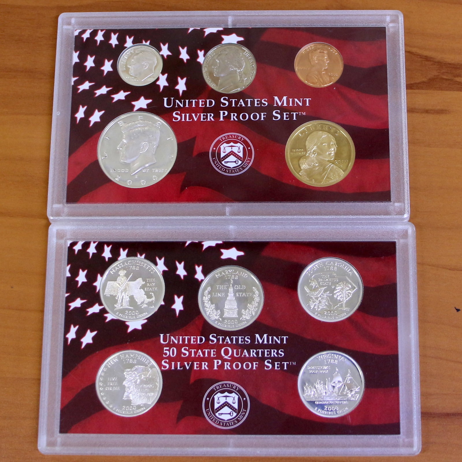 2000 US Mint Silver and Silver State Quarters Proof Coin Sets OGP: Contains one 2000 United States Mint Silver State Quarters Proof Set and 2000 US Mint Silver Proof Set in packaging.