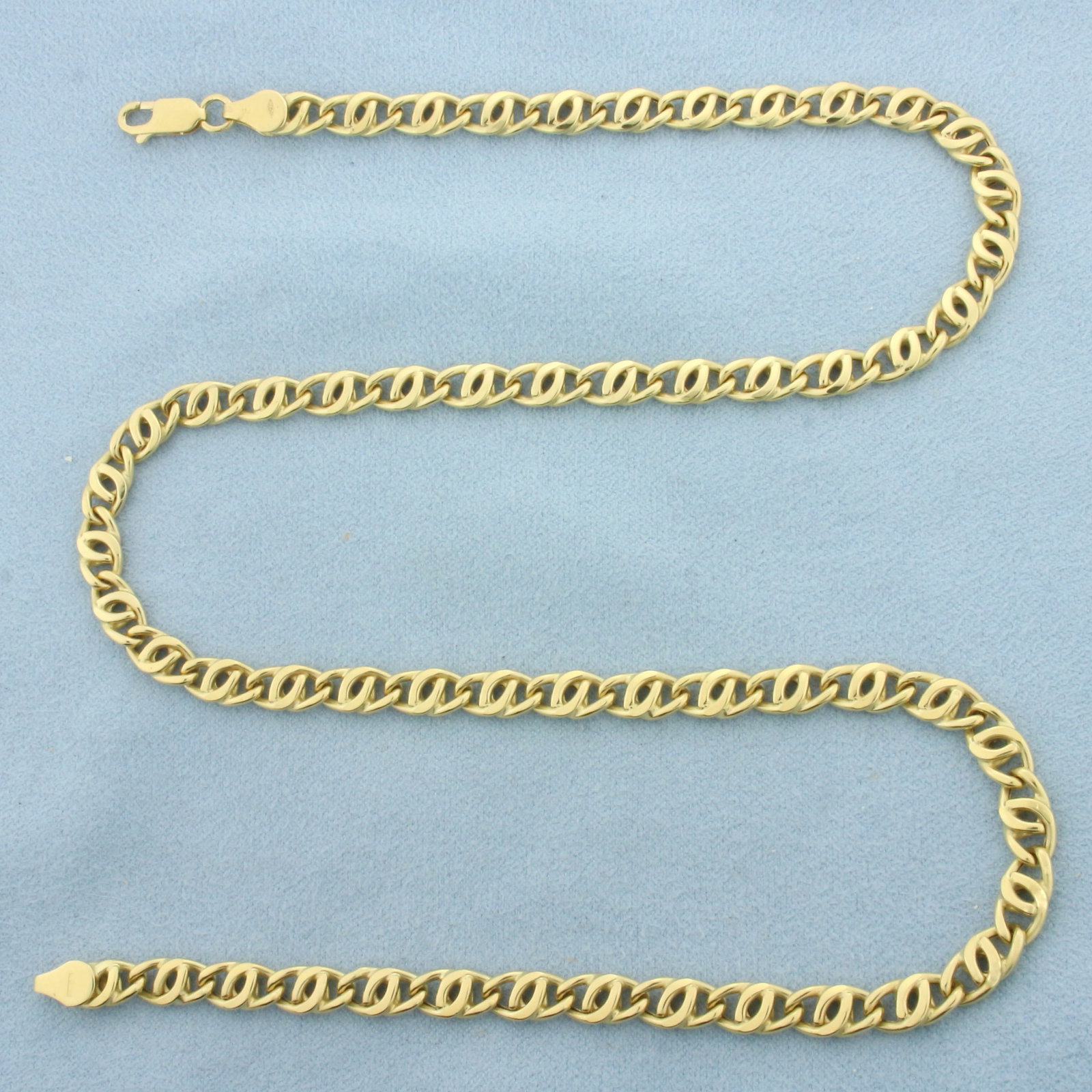 20 Inch Anchor Mariner Link Chain Necklace in 18k Yellow Gold: In 18k Yellow Gold. 20 inches long. 5.6mm wide. Lobster clasp. 18.8g.