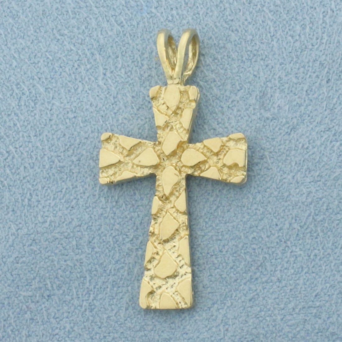 Nugget Style Cross Pendant in 14k Yellow Gold: In 14k Yellow Gold. 1 1/8 inch long (including bale). 5/8 inch wide. 2.4g.