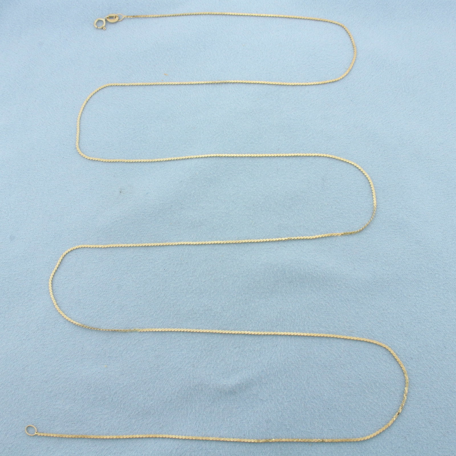 30 Inch Italian S-Link Chain Necklace in 14k Yellow Gold: In 14k Yellow Gold. 30 inches long. 1.2mm wide. Italian made. Spring clasp. 2.8g.