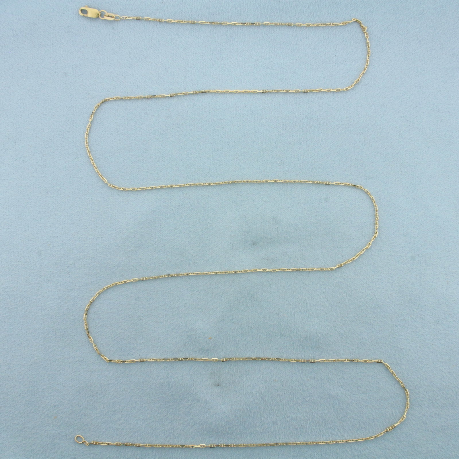 30 Inch Italian Anchor Mariner Link Chain Necklace in 14k Yellow Gold: In 14k Yellow Gold. 30 inches long. 1.3mm wide. Italian made. Lobster clasp. 3.2g.