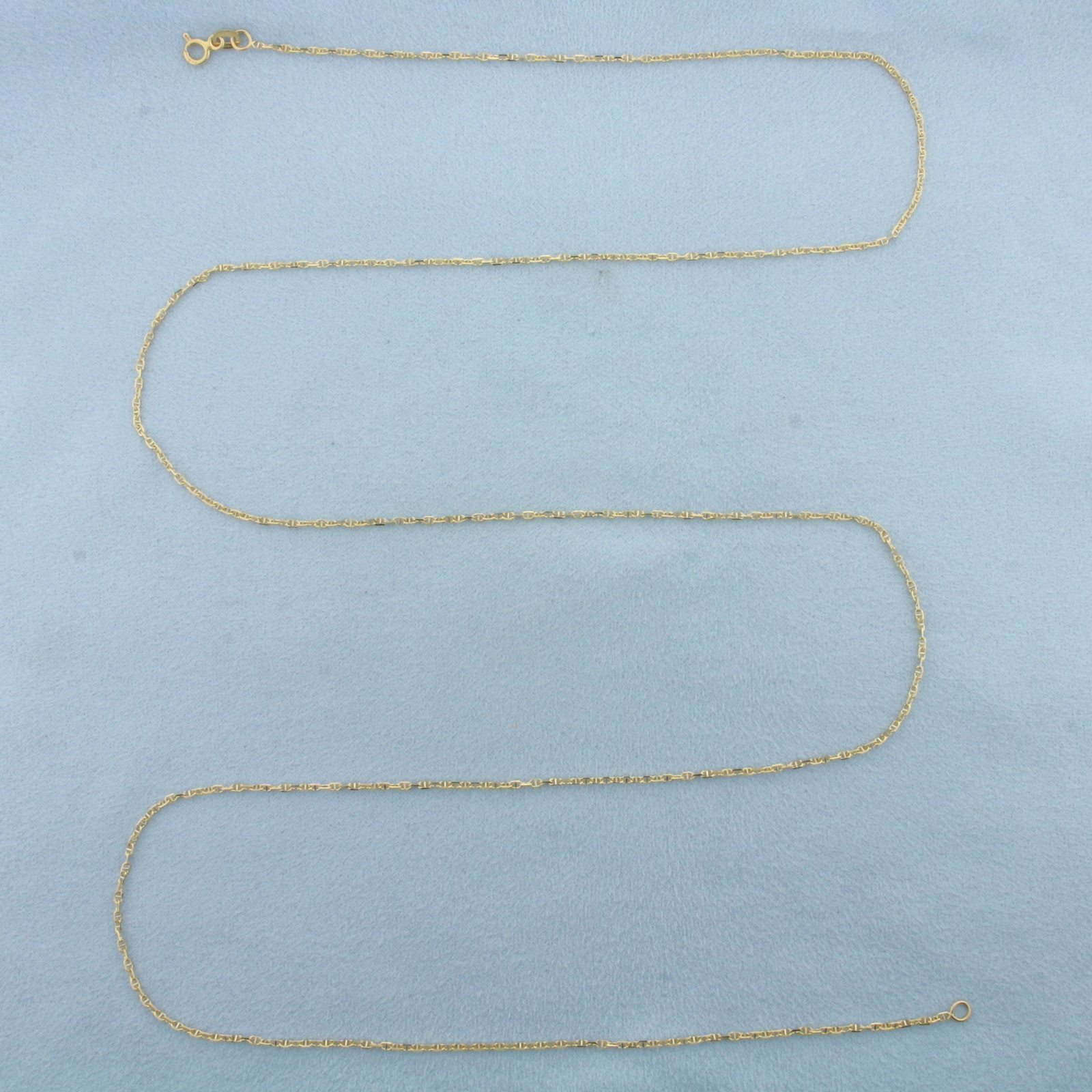 30 Inch Italian Anchor Mariner Link Chain Necklace in 14k Yellow Gold: In 14k Yellow Gold. 30 inches long. 1.3mm wide. Italian made. Spring clasp. 2.8g.