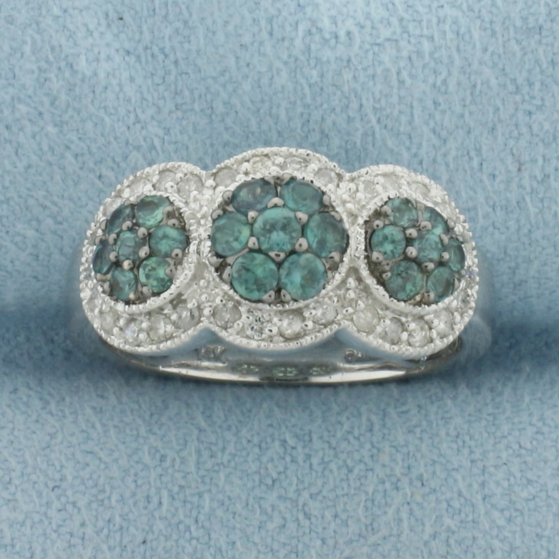 Spinel and Diamond Ring in 14k White Gold: In 14k White Gold. Contains 21 high quality natural 2.25mm Spinel gemstones, approximately 3/4ct TW, with vibrant color and excellent clarity. Also contains thirty high quality 1/2pt diamonds. 10mm wi