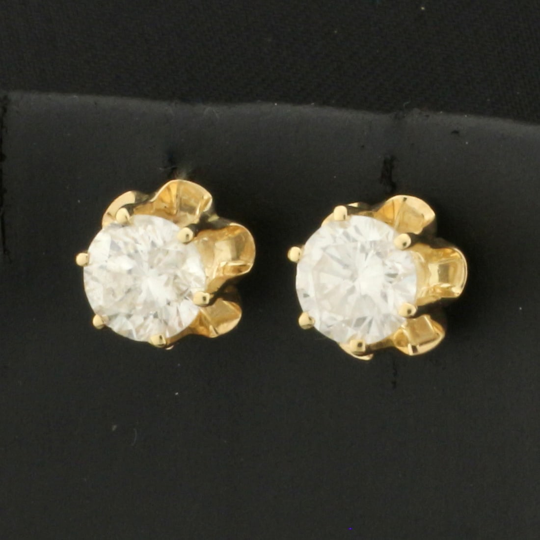 1.8CT Diamond Screw Back Stud Earrings in 14k Yellow Gold: In 14k yellow gold. Contains two high quality round brilliant diamonds, 1.8ct TW, G color/I clarity. Screw backs. 2.4g.