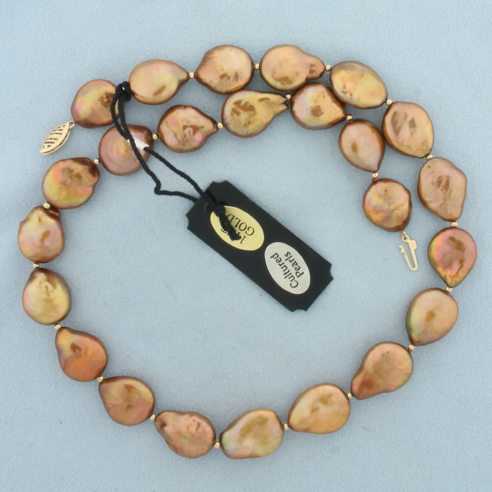 Designer Lucoral Baroque Pearl and Gold Bead Necklace in 14k Yellow Gold: In 14k yellow gold. Contains high quality 14mm baroque pearls with beautiful copper iridescent color. Also contains 2mm gold beads between each pearl. 18 inches long. Brand new, tag still attached. Fi