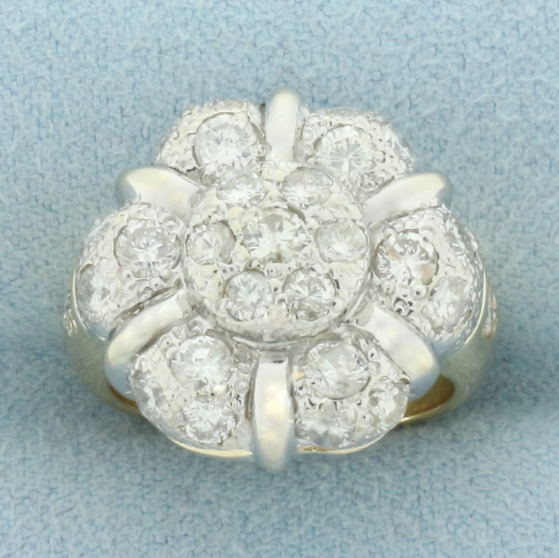 Flower Design Diamond Ring in 18k Yellow and White Gold: In 18k yellow and white gold. Contains 27 high quality diamonds, 1.5ct TW, SI2 clarity/G color. 18mm at center. Size: 3.5. 9.5g.