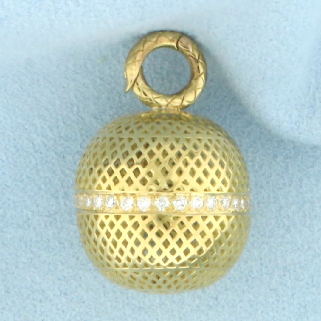 Designer Ray Griffiths Diamond Crownwork Ball Pendant in 18k Yellow Gold: In 18k yellow gold. Contains .65ct TW of high quality diamonds, VS clarity/F color. Can be attached to regular chain, beads, or pearls. In excellent, like new condition. 1 1/8 inches long, 3/4 inch di