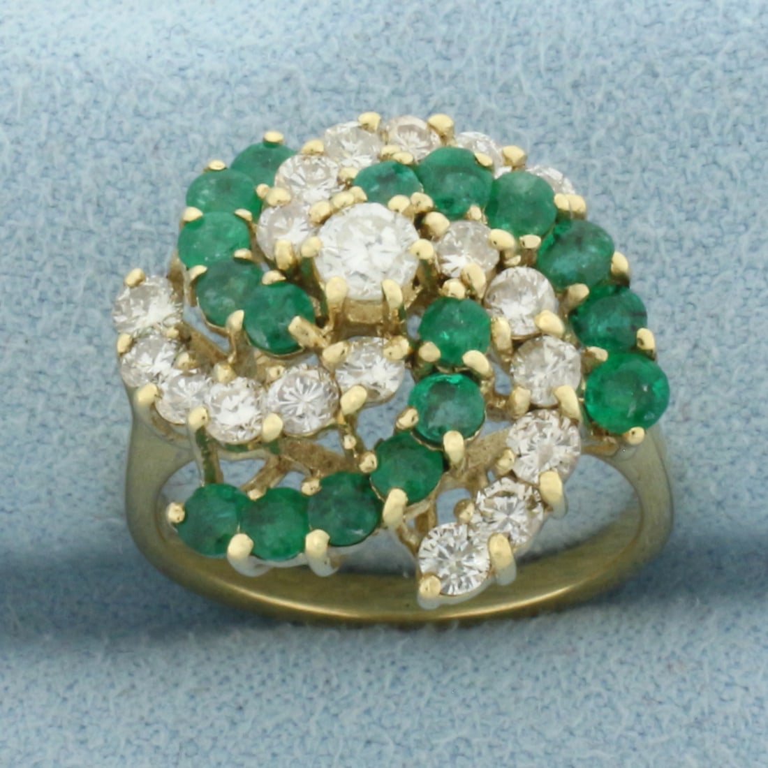 Emerald and Diamond Swirl Design Ring in 14k Yellow Gold