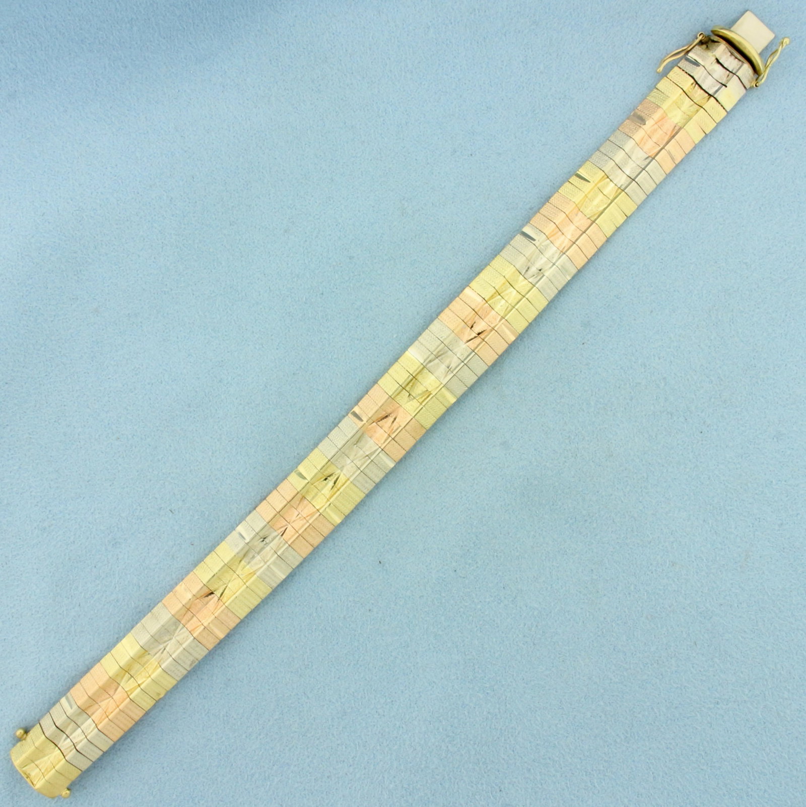 Tri Color Diamond Cut Omega Bracelet in 14k Yellow, Rose, and White Gold