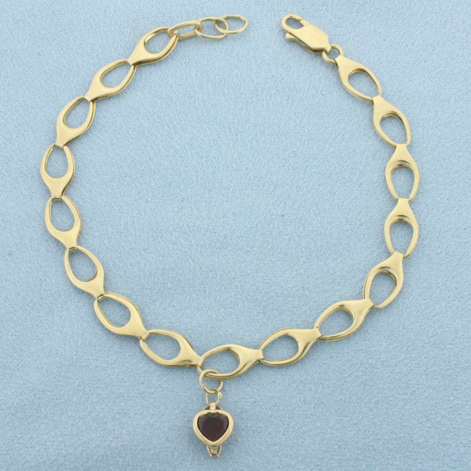 Oval Link Charm Bracelet with Garnet Charm in 10k Yellow Gold