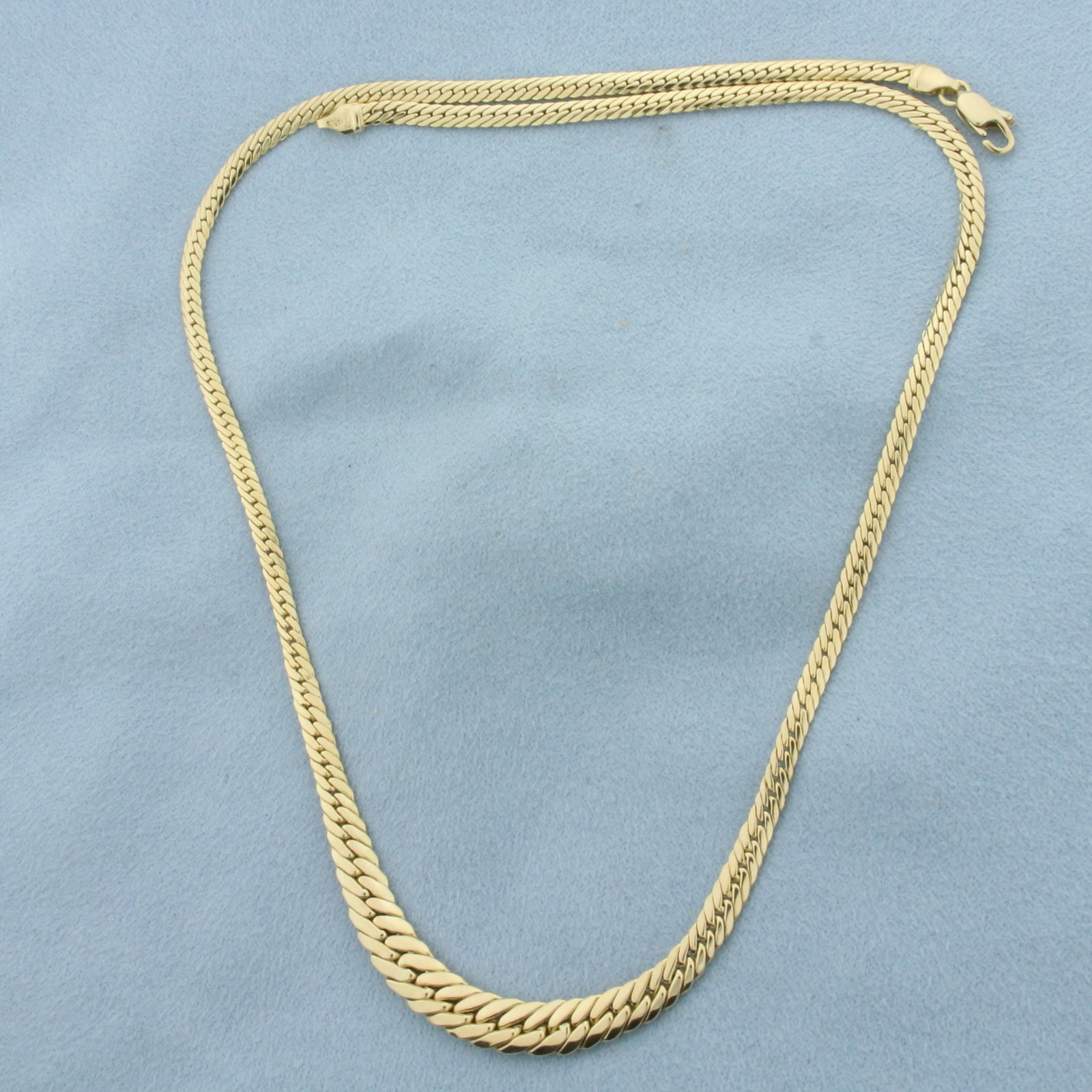 17 Inch Italian Graduated Herringbone Link Chain Necklace in 14k Yellow Gold: In 14k Yellow Gold. 17 inches long. 2-6mm wide. Italian made. Lobster clasp. 6.2g.