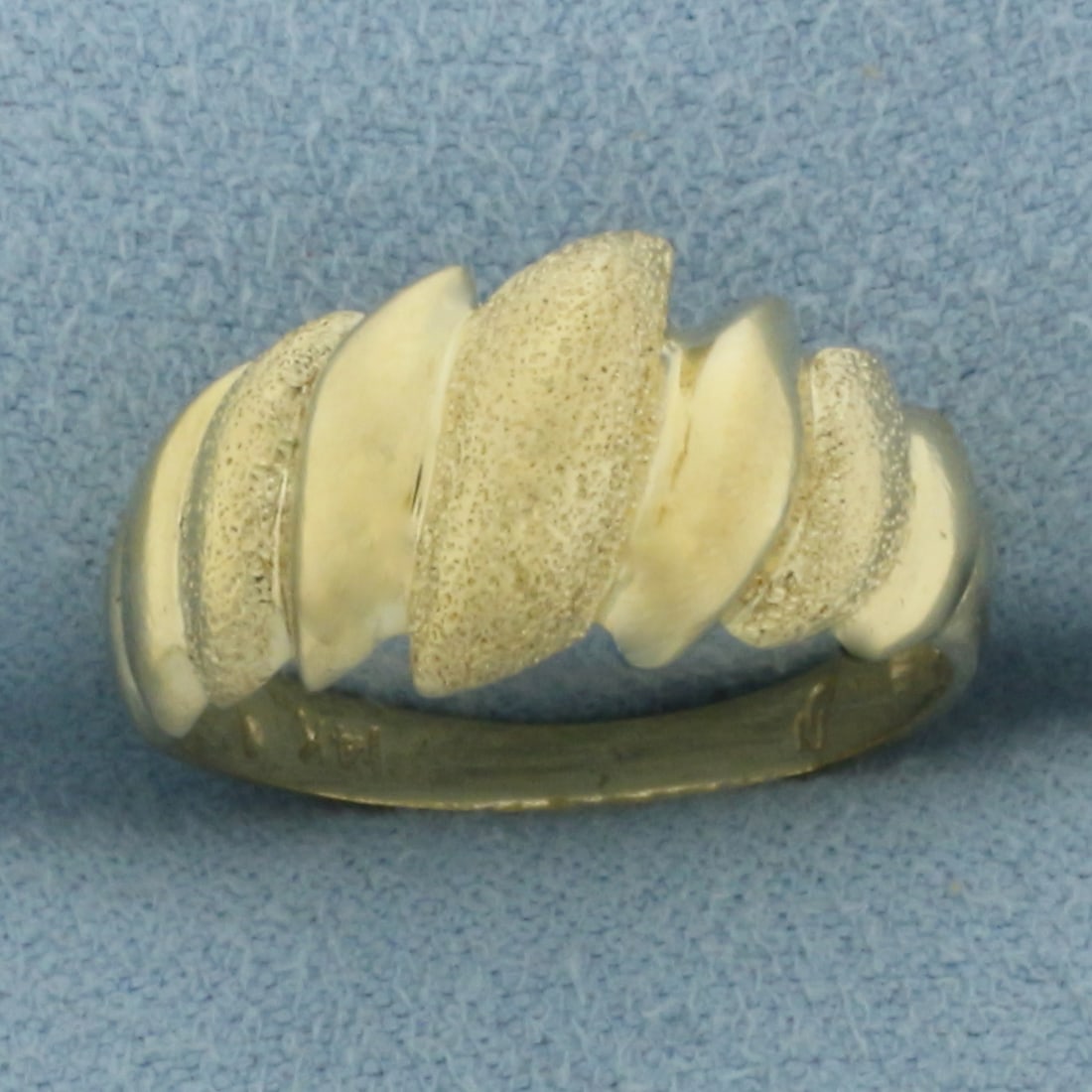 Sandblast Finish Dome Ring in 14k Yellow Gold: In 14k Yellow Gold. 10.8mm wide (at widest point). Size 7. 3.4g.