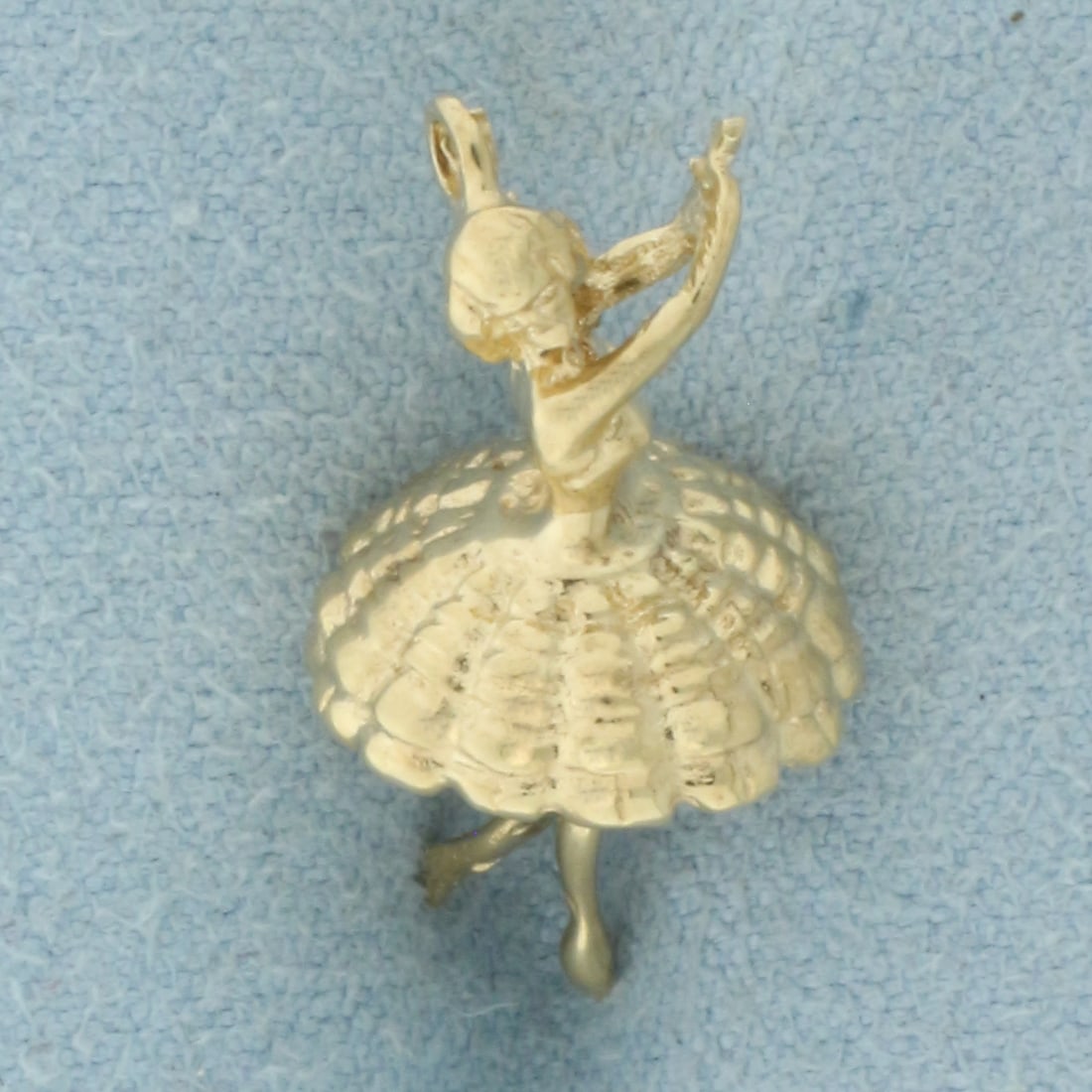 3-D Ballerina Charm in 14k Yellow Gold: In 14k Yellow Gold. 7/8 inch long. 3/8 inch wide. 2.5g.