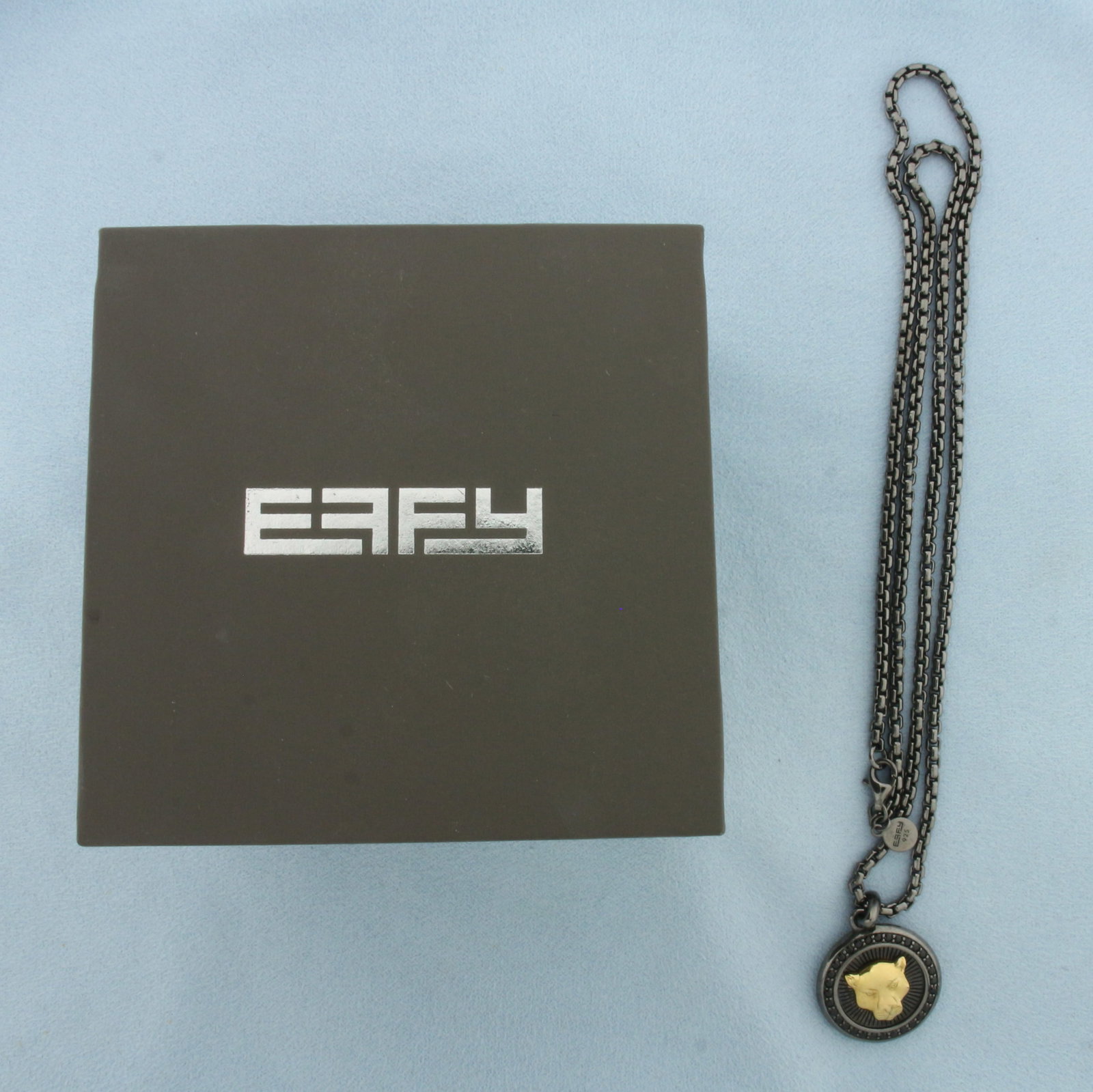 Effy Mens Two Tone Spinel Panther Necklace in Sterling Silver: In.925 Sterling Silver. 1 inch long by 3/4 inch wide pendant accented with high quality Black Spinel gemstones. 22 inches long chain. 2.6mm wide. Lobster clasp. Original box included.