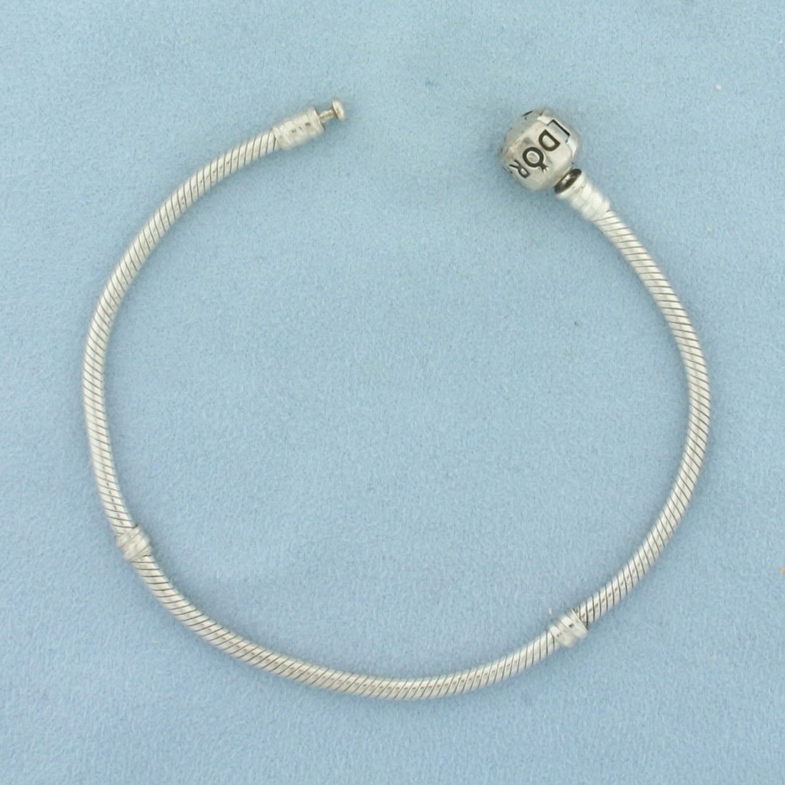 Pandora Classic Vintage Moments Barrel Clasp Snake Bracelet in Sterling Silver: In .925 Sterling Silver. Bracelet size is 8.3 inches long (fits 7.5-7.9 inch wrist).
