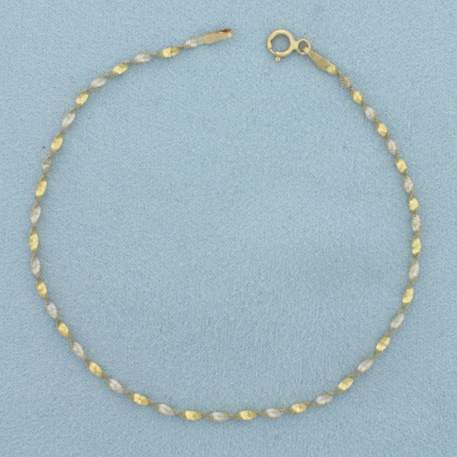 Two Tone Twisting Herringbone Bracelet in 14k Yellow and White Gold