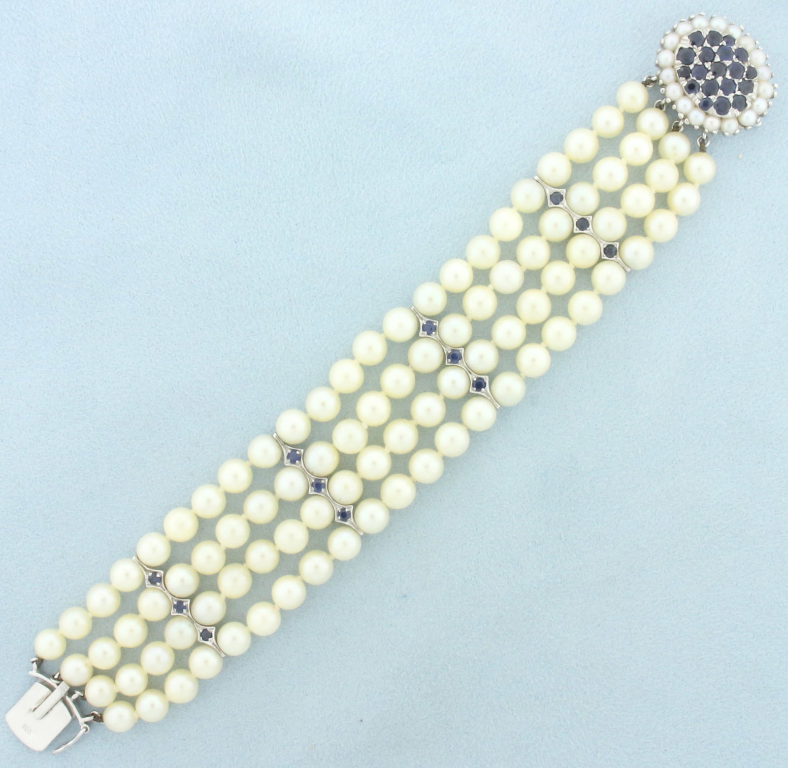 Vintage Sapphire and Cultured Akoya Pearl Bracelet in 14k White Gold: In 14k white gold. Milgrain detail. Contains thirty one high quality sapphires, 2ct TW, with deep color and excellent clarity. Also contains ninety two 6mm and eighteen 3mm high quality cultured