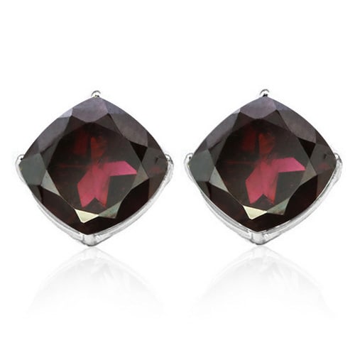 6MM Cushion Garnet Earrings in Sterling Silver: In platinum over .925 sterling silver basket mountings with friction backs included. Contains 2 cushion cut Garnet gemstones with excellent color and clarity, approx. 2.5CTW, 6mm each. 1.6g