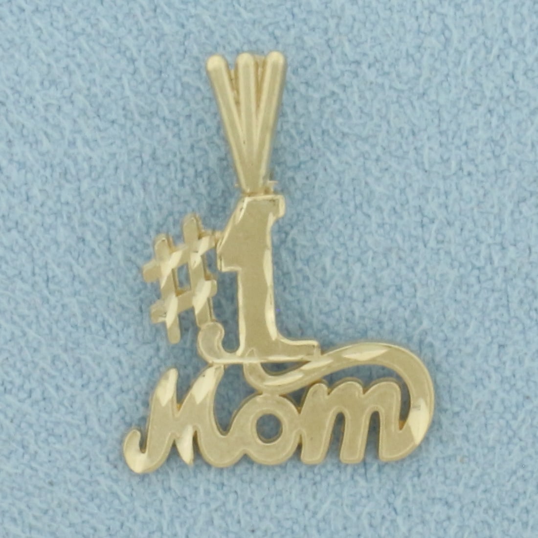 Number One #1 Mom Pendant in 14k Yellow Gold: In 14k Yellow Gold. 3/4 inch long (including bale). 5/8 inch wide. .9g.