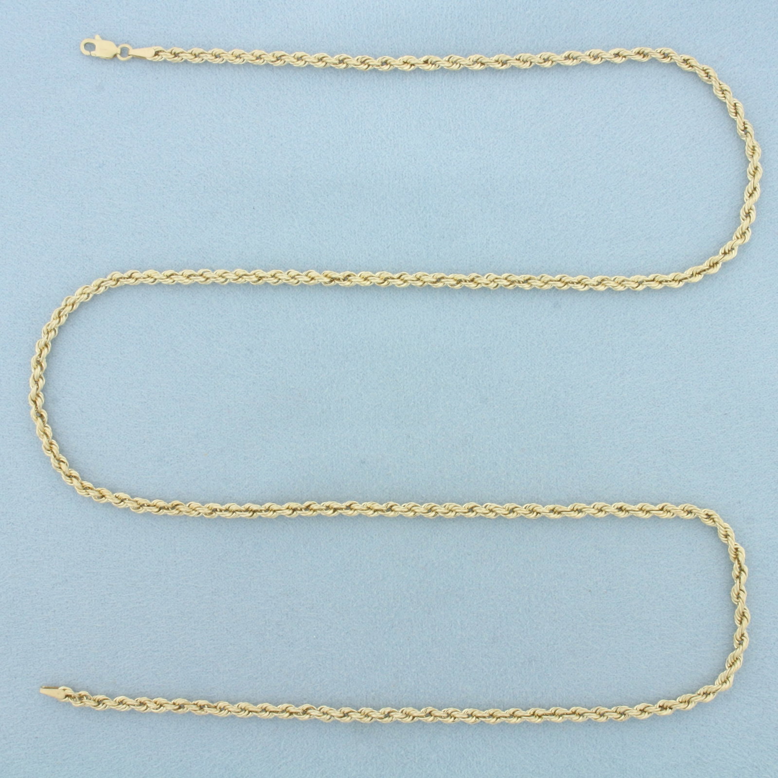 25 Inch Rope Link Chain Necklace in 10k Yellow Gold: In 10k Yellow Gold. 25 inches long. 3.1mm wide. Lobster clasp. 4.9g.