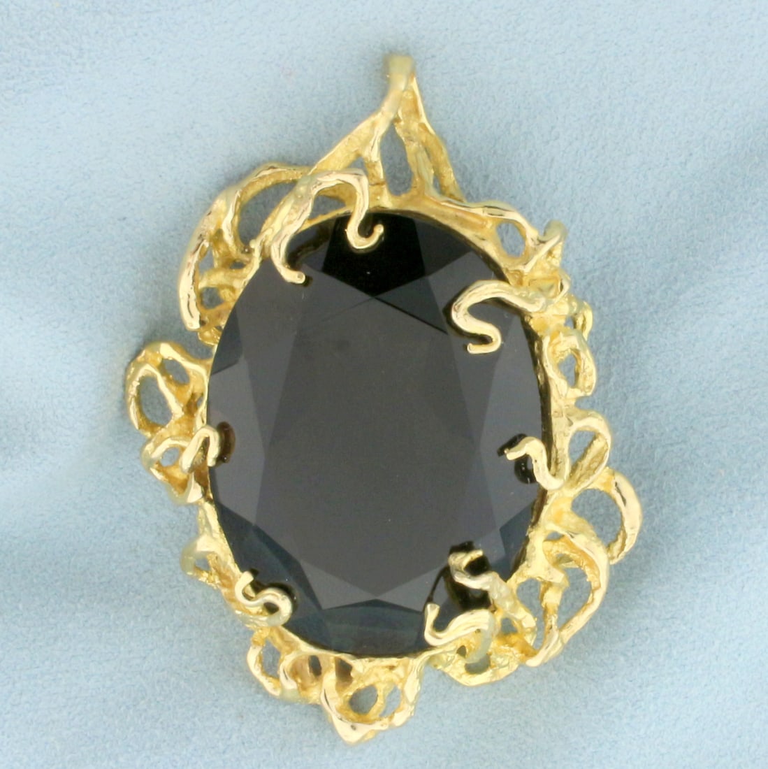 Large Smoky Topaz Statement Pendant in 14K Yellow Gold: In 14K Yellow Gold. Contains a high quality natural 40mmx30mm 100ct oval cut Smoky Topaz gemstone with warm color and excellent clarity. 2 1/2 inches long. 42.9g