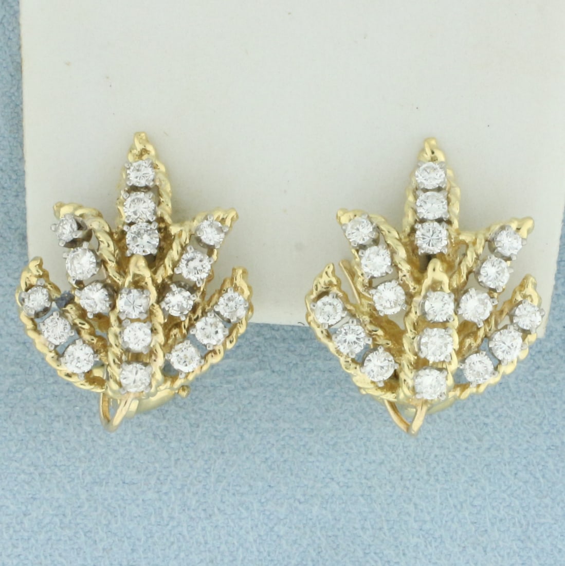Vintage Diamond Leaf Design Clip On Earrings in 18k Yellow Gold: In 18k yellow gold. Contains 36 high quality diamonds, 1.5ct TW, VS clarity/F color. Omega clip on backs, for non pierced ears. Posts can be added for additional cost. 9.3g.