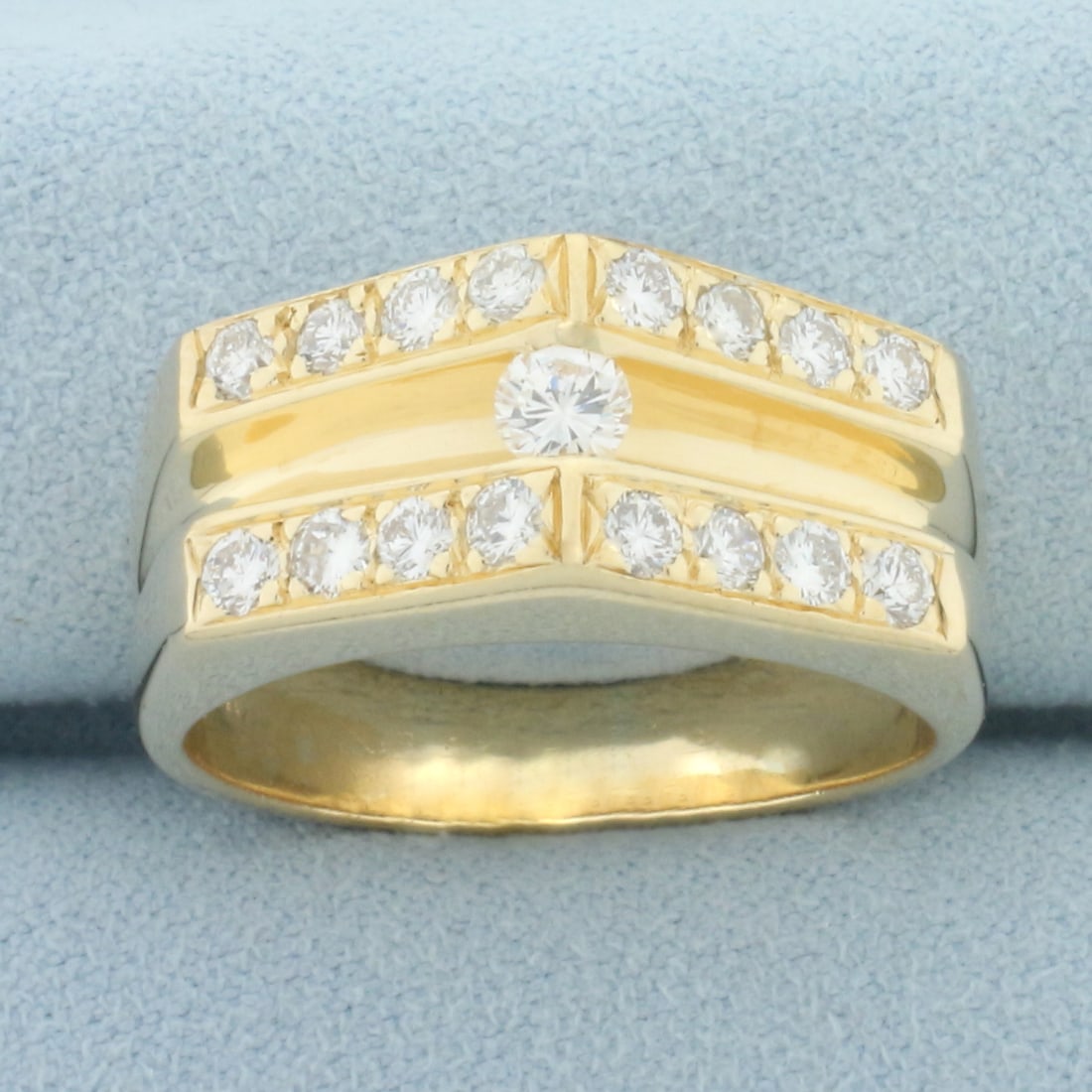 Floating and Pave Set Diamond Ring in 14k Yellow Gold: In 14k yellow gold. Center diamond is high quality 1/5ct round brilliant diamonds VS clarity/F color, great cut for lots of sparkle. Also contains sixteen high quality .05ct diamonds of similar high q