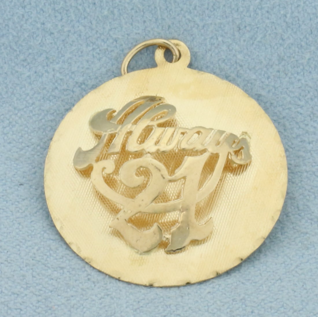 Always 21 Charm or Pendant in 14k Yellow Gold: In 14k Yellow Gold. 1 inch long. 1 inch wide. Can engrave on back. 3.6g.