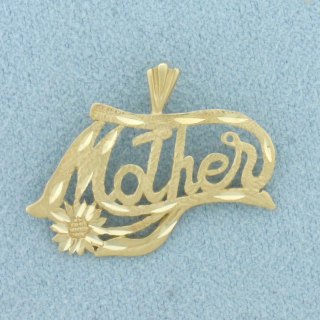 Mother Sunflower Pendant in 14k Yellow Gold: In 14k Yellow Gold. 3/4 inch long (including bale). 1 inch wide. 1.5g.