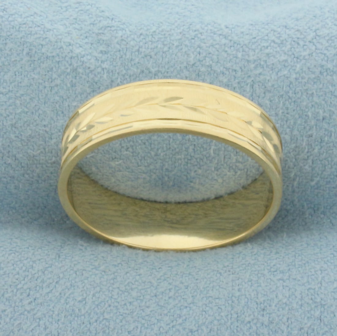 Mens Diamond Cut Leaf Design Band Ring in 14k Yellow Gold: In 14k Yellow Gold. 6mm wide. Size 10. 4.3g.