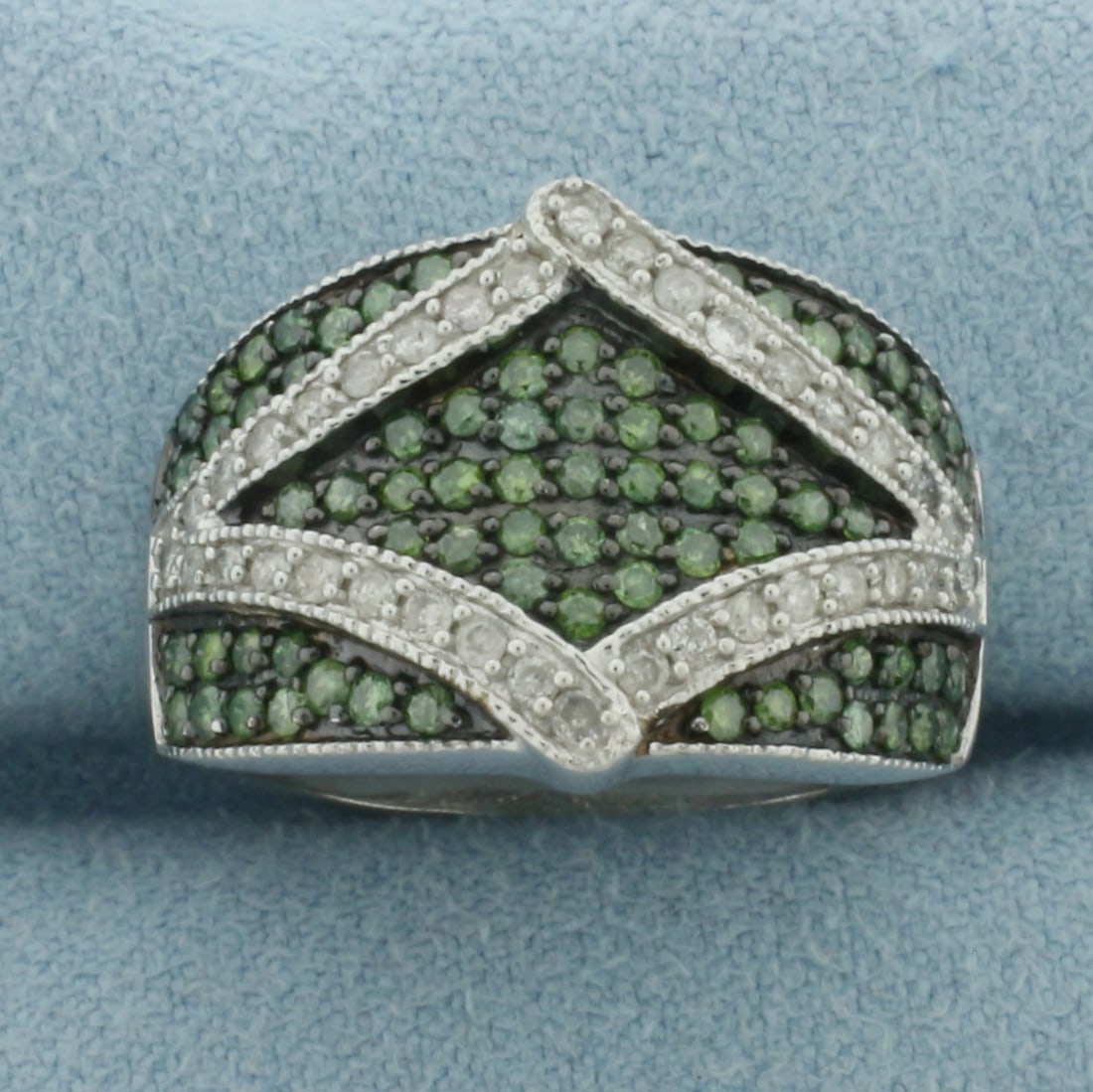 Green and White Diamond Pave Ring in 10k White Gold: In 10k White Gold. Contains thirty-six .01ct white and seventy-five .01ct green high quality natural diamonds. 15mm wide at top of ring. Size 8.25. 5.3g.