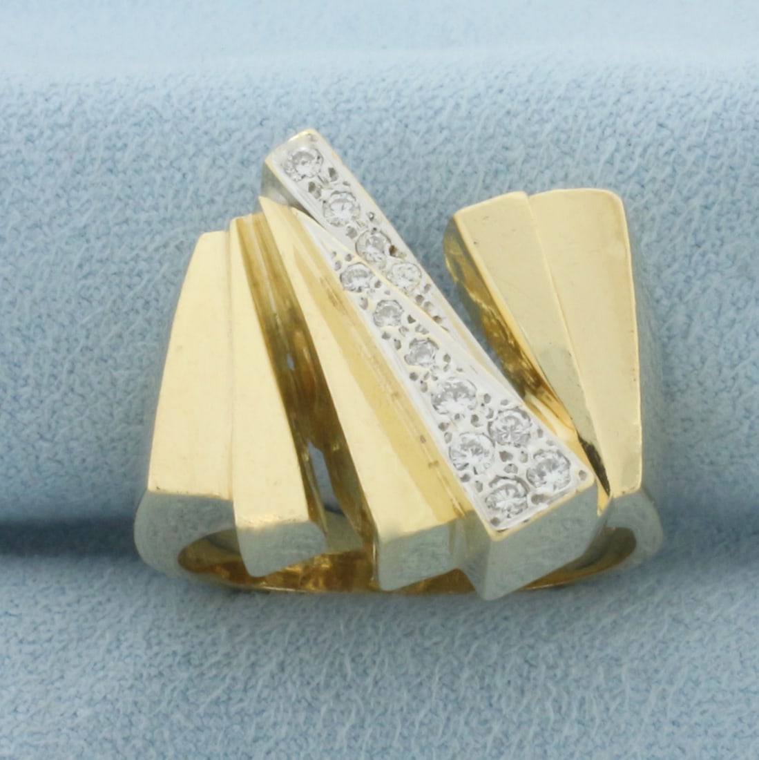 Modern Abstract Design Diamond Ring in 14k Yellow Gold: In 14k Yellow Gold. Contains nine .02ct and three .01ct high quality diamonds, SI clarity/G color. 19mm wide at top of ring. Size 8. 15.4g.