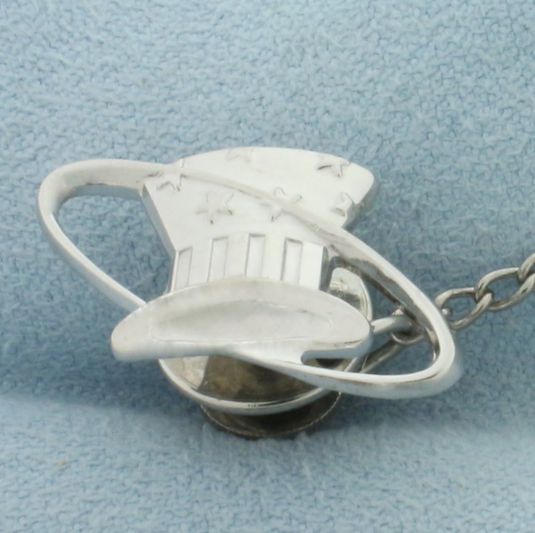 Vintage Eastern Airlines Hat Pin in 10k White Gold: Pin is 10k White Gold, back and chain is gold plated. 7/8 inch wide. 5/8 inch tall. 5.0g.