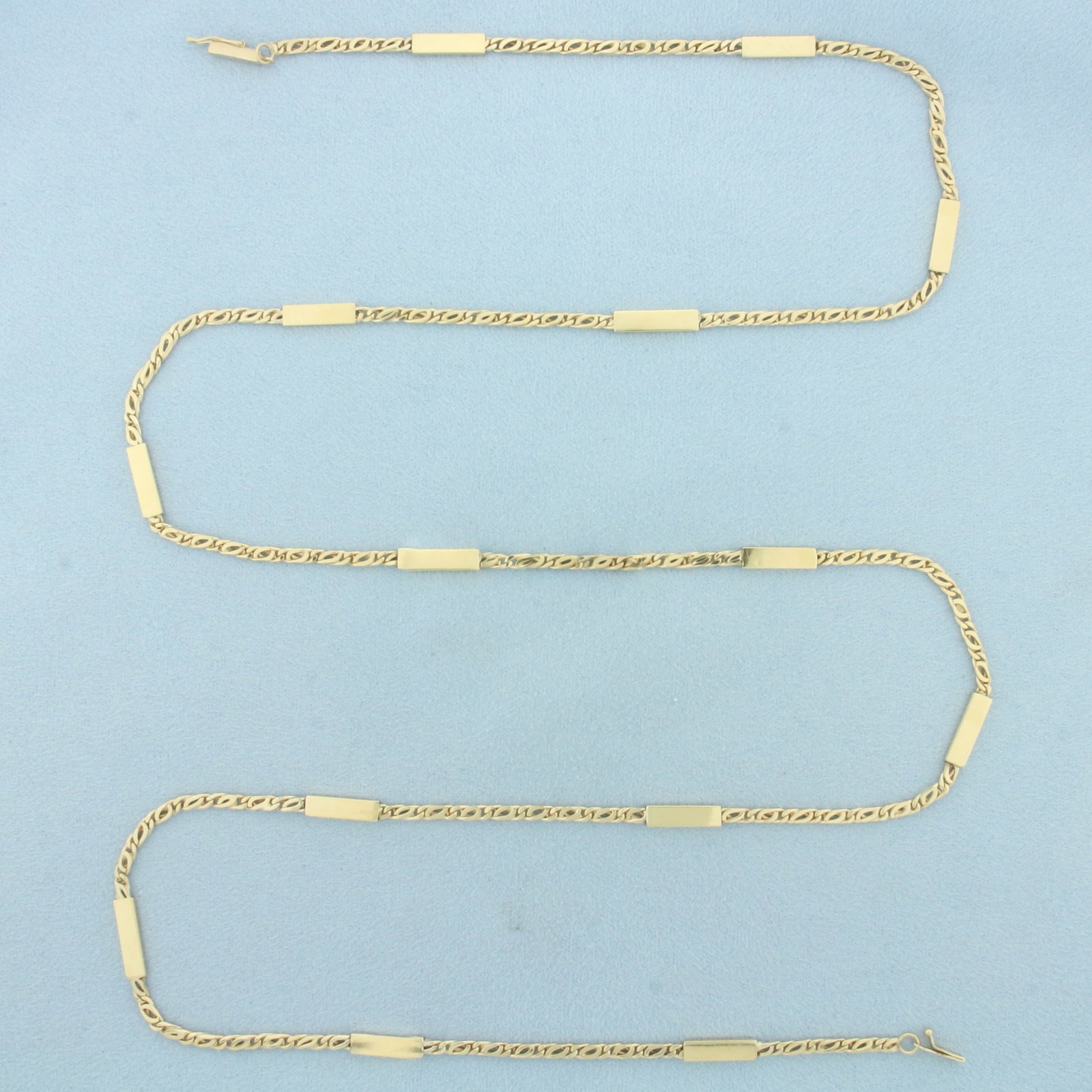 32 Inch Bar and Link Chain Necklace in 14k Yellow Gold: In 14k Yellow Gold. 32 inches long. 3.6mm wide. Barrel clasp with safety latch. 19.5g.