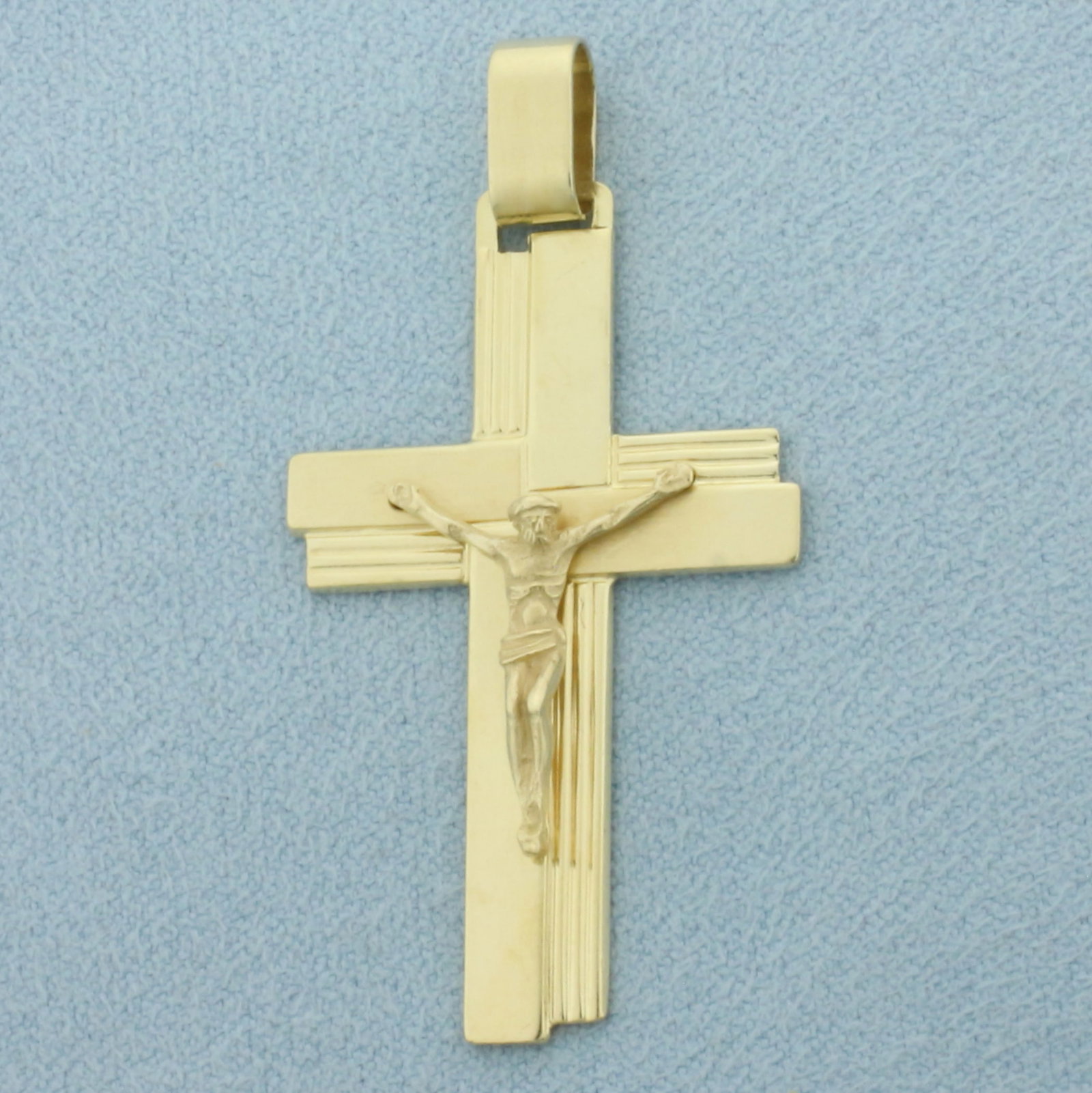 Modern Italian Crucifix Cross Pendant in 14k Yellow Gold: In 14k Yellow Gold. 1 3/4 inch long. 1 inch wide. Italian made. 4.8g.