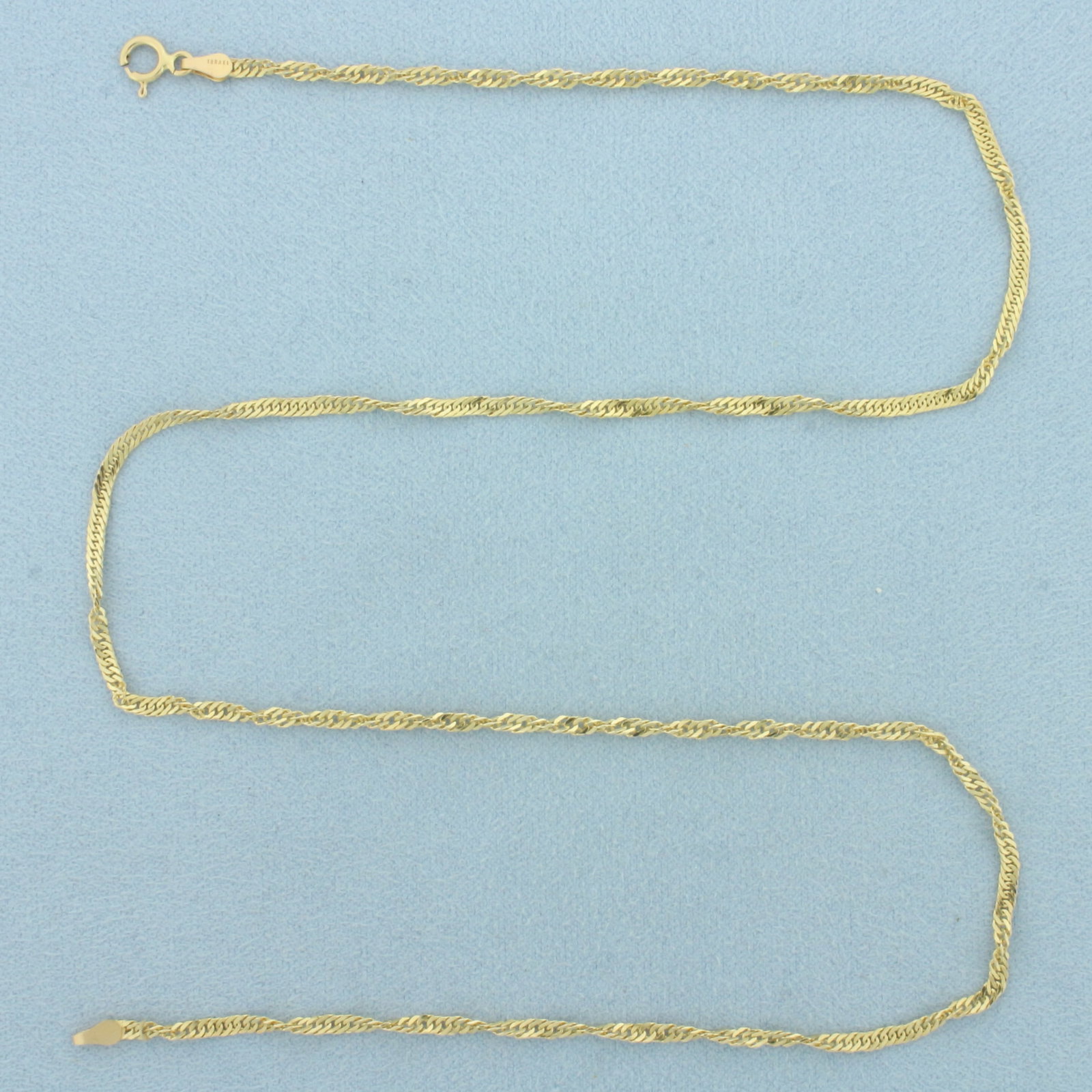 18 Inch Twisting Curb Link Chain Necklace in 14k Yellow Gold
