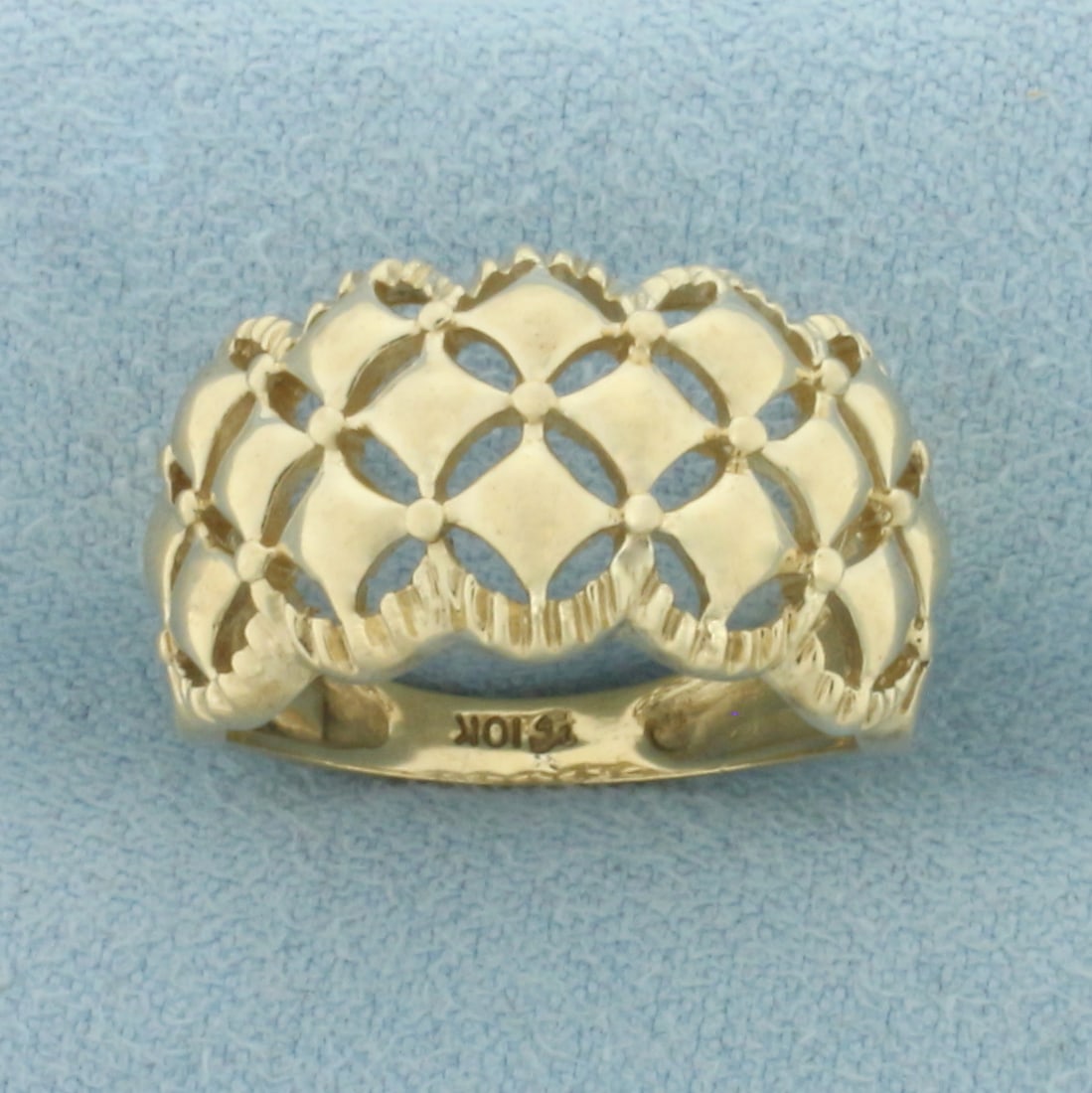 Quilted Diamond Design Ring in 10k Yellow Gold: In 10k Yellow Gold. 3/8 inch wide. Size 6. 3.9g.