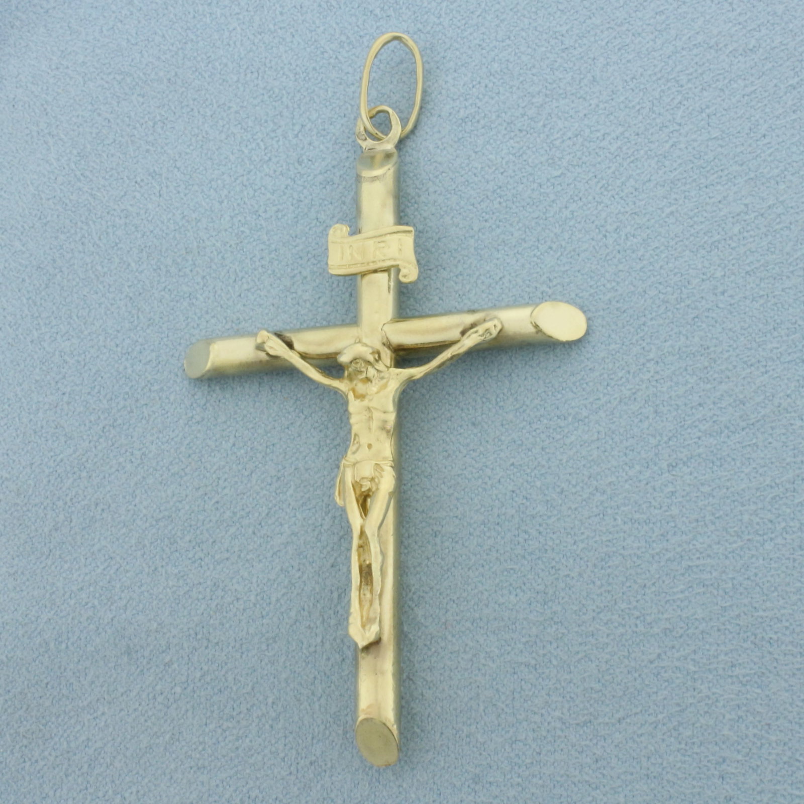 Large Mens Crucifix Cross Pendant in 10k Yellow Gold: In 10k Yellow Gold. 2 3/8 inches long. 1 1/2 inch wide. 4.7g.