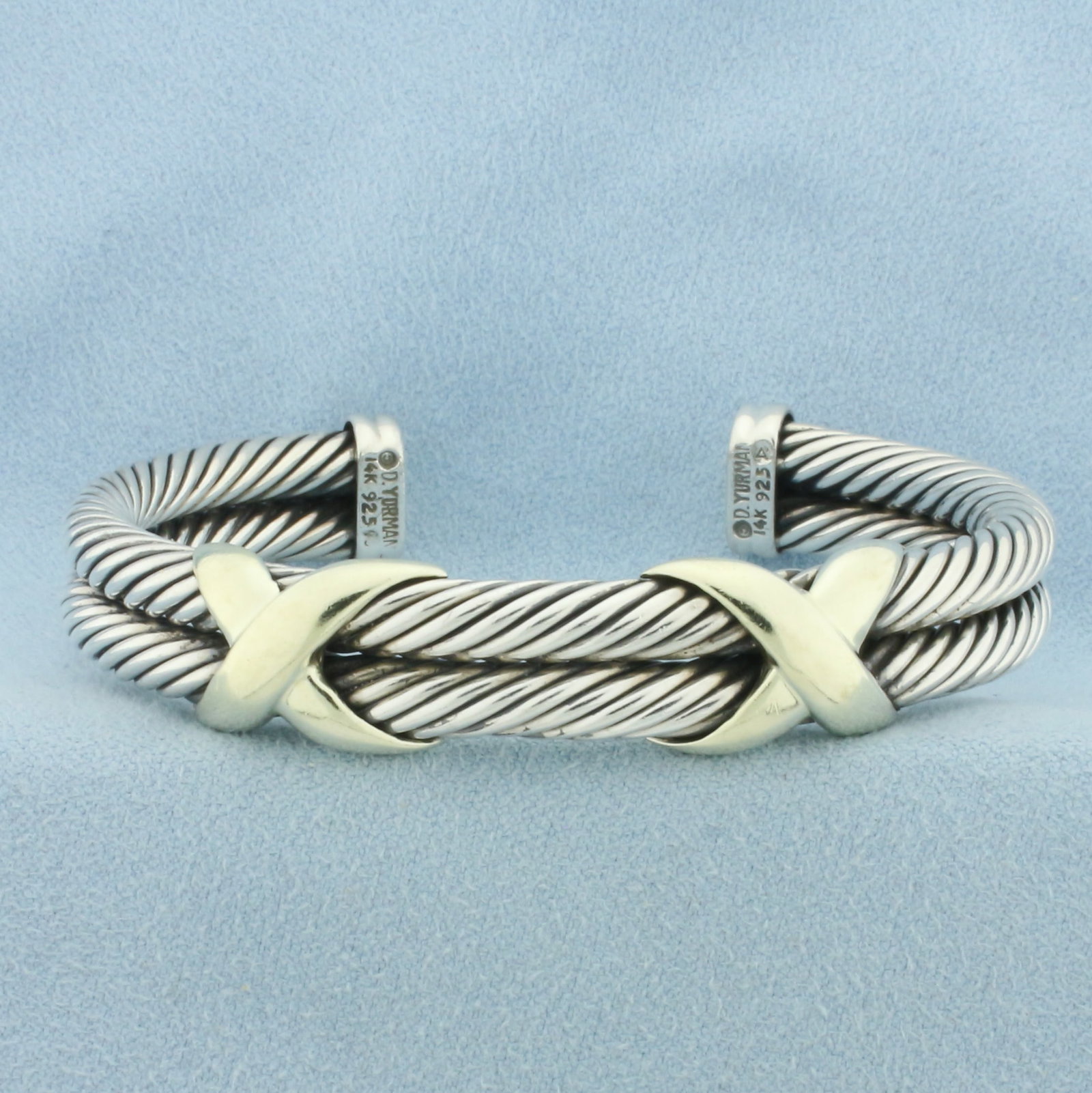 David Yurman Double Cable X Cuff Classic Bracelet in Sterling Silver and 14k Yellow Gold: In .925 Sterling Silver and 14K Yellow Gold. 12mm wide. Interior dimensions: 2 3/8 inches x 1 7/8 inches. Guaranteed Authentic. 50.6g.