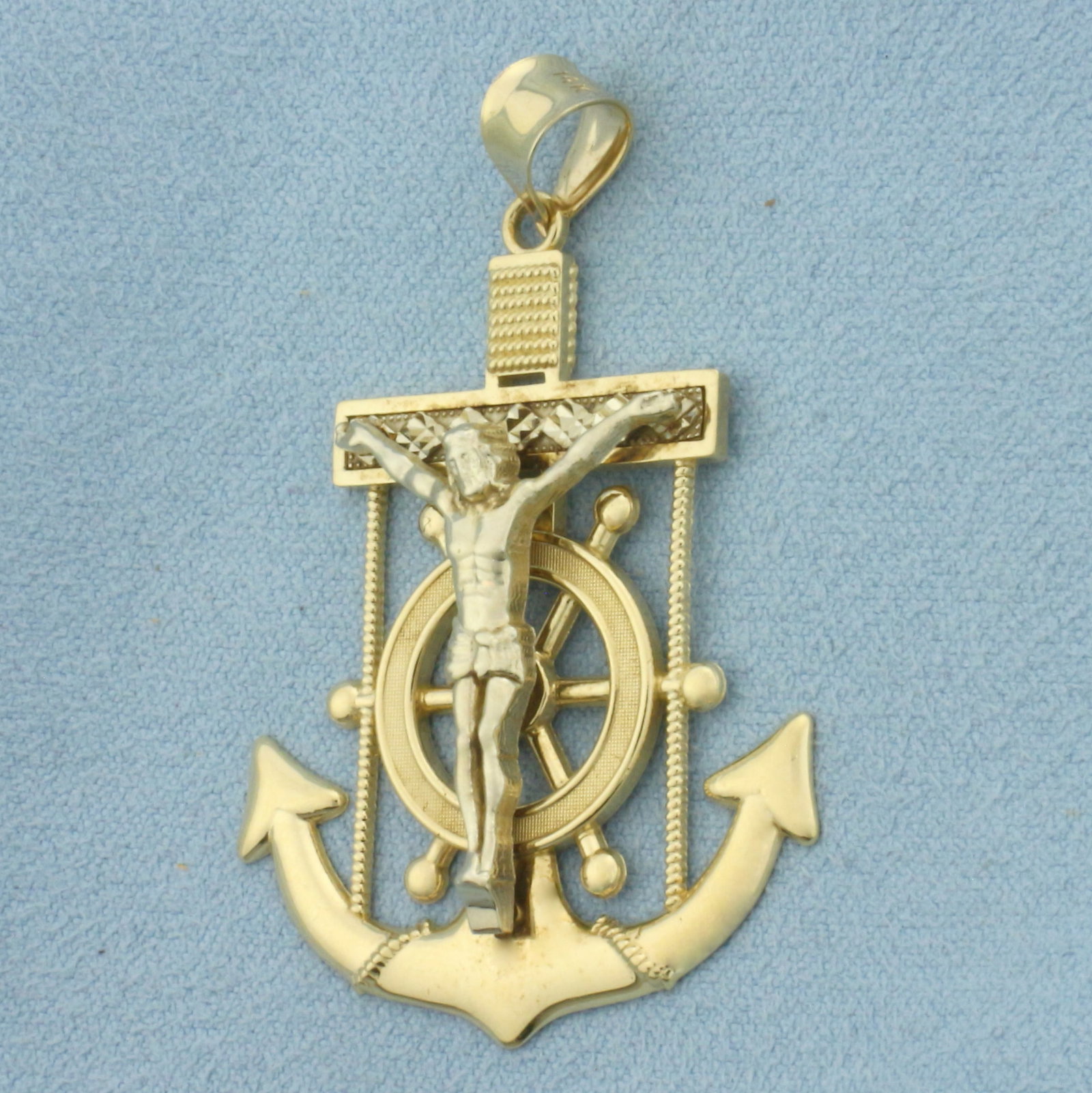 Mariner's Cross Pendant in 14k Yellow Gold: In 14k Yellow Gold. 1 7/8 inch long (including bale). 1 1/4 inch wide at widest. 7.4g.