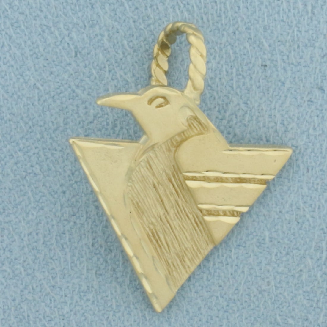 Pittsburgh Penguins NHL Pendant in 14k Yellow Gold: In 14k Yellow Gold. 1 inch long (including bale). 3/4 inch wide. 2.7g.