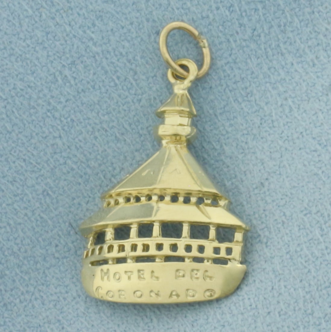 Hotel Del Coronado Charm in 14k Yellow Gold: In 14k Yellow Gold. 7/8 inch long. 5/8 inch wide. 2.0g.