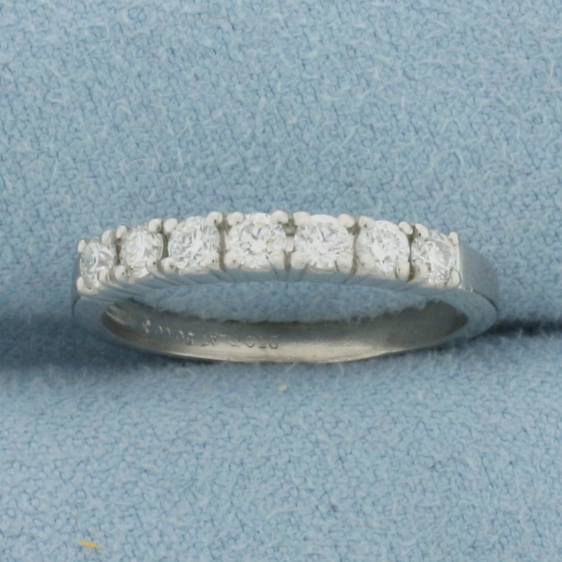 Diamond Wedding or Anniversary Band Ring in Platinum: In Platinum. Contains seven high quality diamonds, 1/2ct TW, G color/SI clarity. 3mm wide. Size 7. 3.8g.