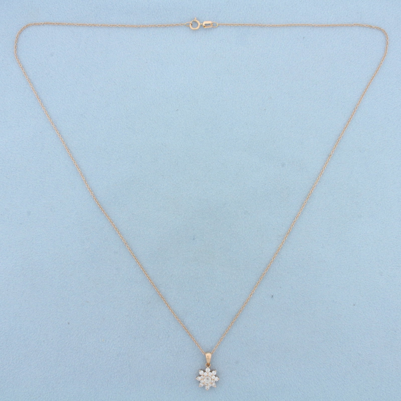 Crown of Light Crown Sun Necklace in 14k Rose Gold: In 14k Rose Gold. Contains one 3.5mm high quality Crown of Light diamond, H color/I1 clarity. Also contains eight .02ct and eight .01ct high quality diamonds of similar high quality. Pendant is 5/8 in