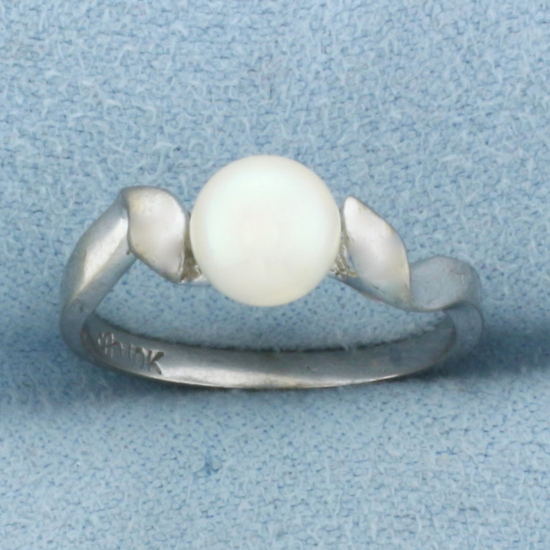 Cultured Pearl Solitaire Ring in 10k White Gold: In 10k White Gold. Contains one 6.3mm high quality Cultured Pearl with high luster. Size 6. 2.0g.