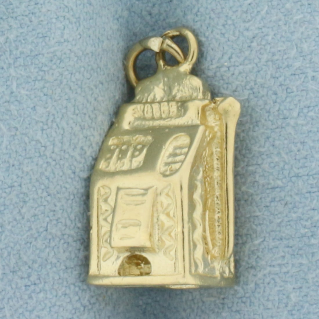 3D Slot Machine Charm in 14k Yellow Gold: In 14k Yellow Gold. 3/4 inch long. 1/2 inch wide. 4.0g.