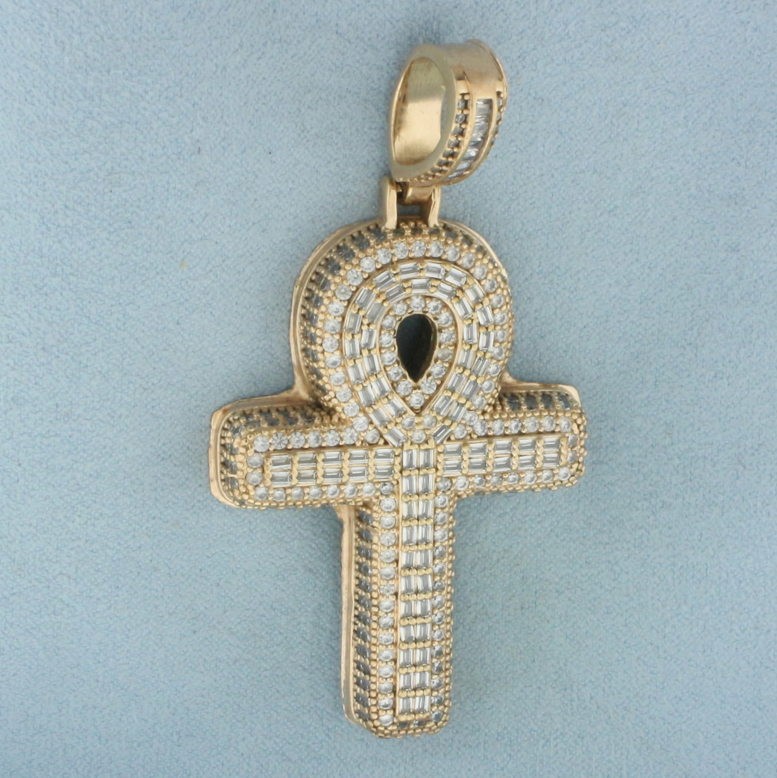 Large Ankh Pendant in 14K Yellow Gold: In 14k yellow gold. 2 5/8 inches long (including bail) by 1 3/8 inches wide. Accented with pave set baguette and round CZ gemstones. 19.6g.